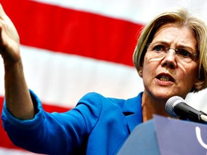 Democratic candidate for U.S. Senate Elizabeth Warren speaks during a campaign rally at the Reggie Lewis Center in Boston, Saturday, Nov. 3, 2012. (AP Photo/Michael Dwyer)