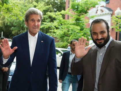 UNITED STATES, Washington : US Secretary of State John Kerry (L) greets Saudi Deputy Crown Prince Mohammed bin Salman outside Kerry's residence prior to their meeting on June 13, 2016, in Washington, DC. / AFP PHOTO / MOLLY RILEY
