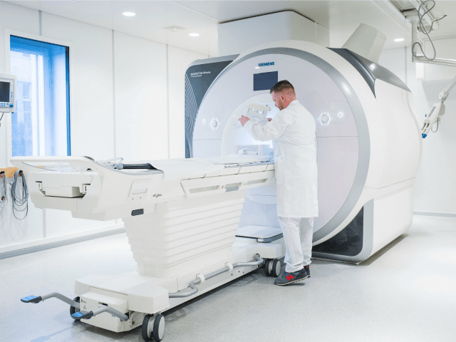 Benny Liberg prepares an MRI scanner at the Huddinge hospital, south-west of Stockholm, on