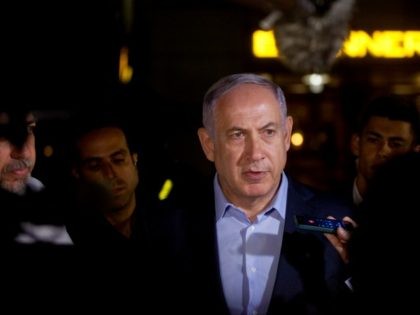 Israeli Prime Minister Benjamin Netanyahu speaks to the press at the scene of a shooting outside Max Brenner restaurant in Sarona Market on June 8, 2016 in Tel Aviv, Israel.