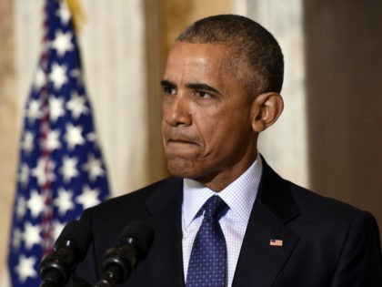 President Barack Obama pauses while speaking at the Treasury Department in Washington, Tue