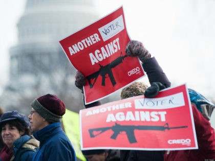 WASHINGTON, D.C. - JANUARY 26: Gun control supporters march from the U.S. Capitol to the Washington Monument to call on Congress to pass gun control measures on January. 26, 2013 in Washington, D.C. (Photo by Bill Clark/Getty Images)