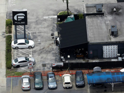 This photo shows the Pulse nightclub following a fatal shooting Sunday, June 12, 2016, in Orlando, Fla. (AP Photo/Chris O'Meara)