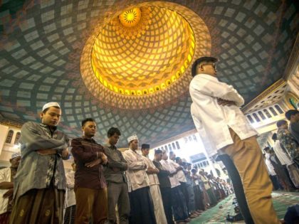 Indonesian Muslims hold prayers to mark the start of the holy month of Ramadan at the Al Akbar mosque in Surabaya on June 5, 2016. Indonesia, the world's most populous Muslim-majority country will begin observing the fasting month of Ramadan.