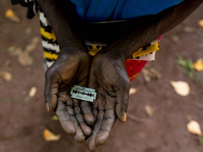 *** EXCLUSIVE *** MOMBASA, KENYA - JUNE 25: Cutter Anna-Moora Ndege shows the razorblade she uses to cut girls' genitals , on June 25, 2015, in Mombasa, Kenya. THESE are the rudimentary tools used to cut young girls sexual organs in remote villages in Kenya. The cruel practice of female …