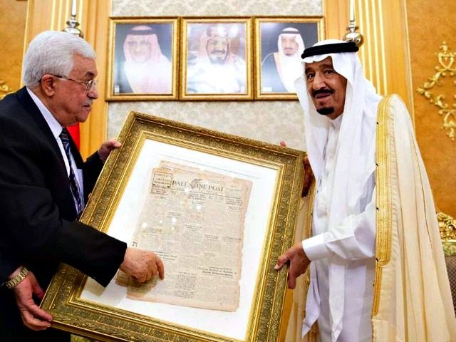 Mahmoud Abbas handing Saudi King Salmon a copy of Zionist newspaper