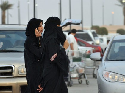 Saudi women walk outside a shopping mall in Riyadh on June 22, 2012. Saudi female activist