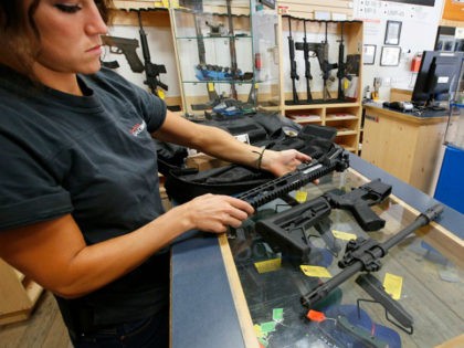 SPRINGVILLE, UT - JUNE 17: Courtney Manwaring unpacks an AR-15 semi-automatic gun kit at Action Target on June 17, 2016 in Springville, Utah. Semi-automatics are in the news again after the nightclub shooting in Orlando F;lord last week. (Photo by George Frey/Getty Images)