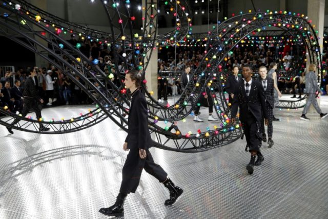 Models present creations for Dior, during the men Spring summer 2017 collection fashion sh