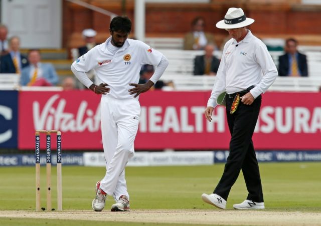 Sri Lanka's Nuwan Pradeep (L) reacts after bowling England's Alex Hales but umpire Rod Tuc