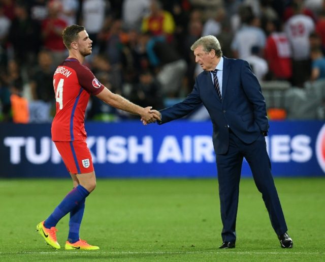 England's coach Roy Hodgson (R), with midfielder Jordan Henderson, said, "As far as I'm co