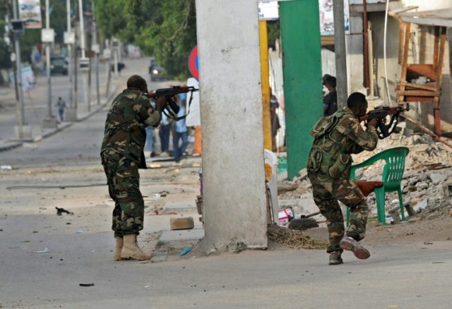 Somali security forces intervene after a car bomb attack claimed by Al-Qaeda-affiliated Sh