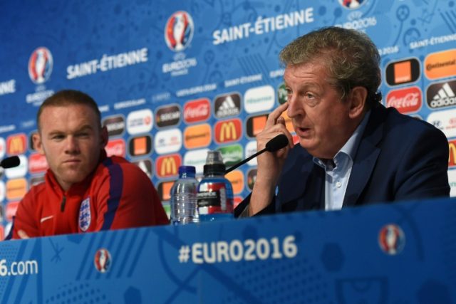 England's coach Roy Hodgson (R), pictured with England captain Wayne Rooney on June 19, 20