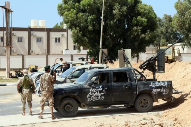 Forces loyal to Libya's UN-backed unity government gather in Sirte's centre on June 10, 20