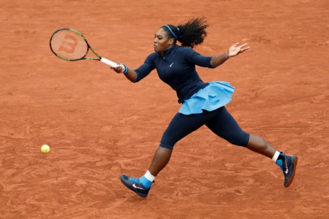 US player Serena Williams returns the ball to Netherlands' Kiki Bertens during their women