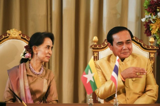 Thailand's Prime Minister Prayuth Chan-Ocha (right) and Myanmar's foreign minister Aung Sa
