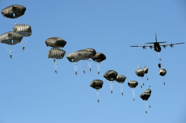 US troops land with parachutes at the military compound near Torun, central Poland, on Jun