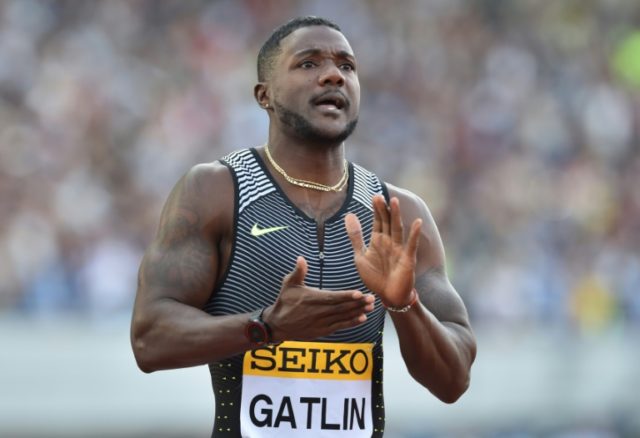 Justin Gatlin of the US reacts after winning the men's 100 metres athletics event during t