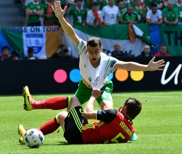 Ireland's Seamus Coleman (back) challenges Belgium's Jan Vertonghen during their Euro 2016