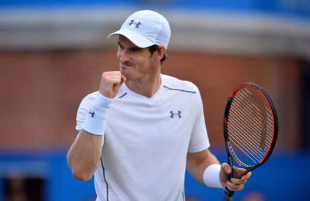 Britain's Andy Murray celebrates after beating France's Nicolas Mahut during the ATP Aegon