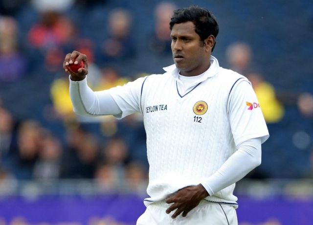 Sri Lanka's captain Angelo Mathews catches the ball during a Test match against England, i