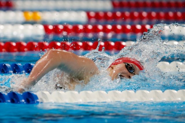 American Katie Ledecky wins the 400m freestyle at the US swimming trials in 3min 58.98sec