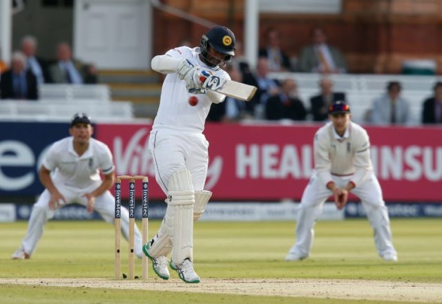 Sri Lanka's Dimuth Karunaratne hits the ball on the fourth day of the third test match aga