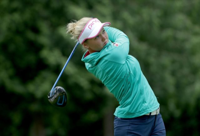 Brooke Henderson of Canada hits a tee shot on the seventh hole during the final round of t