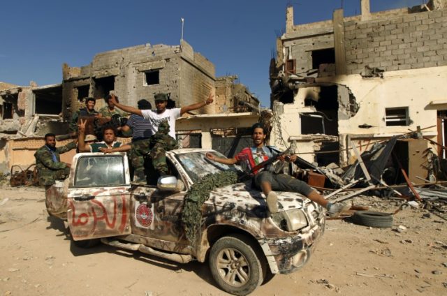 For two years the Libyan city of Benghazi has seen battles between loyalist forces, pictur