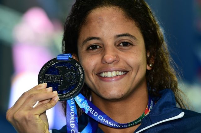Brazil's Etiene Medeiros poses with her silver medal during the podium ceremony for the wo