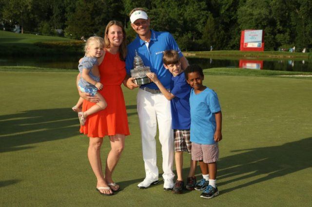 Billy Hurley III poses with wife Heather, and children Will, Jacob, and Madison after winn
