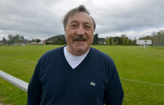 Czech football legend Antonin Panenka poses for a photo during an interview with AFP in Ne