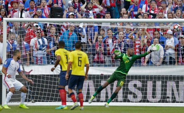 USA's Clint Dempsey (L) scores a header against Ecuador during their Copa America Centenar