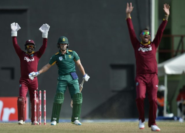Sunil Narine celebrates dismissing South Africa's Farhaan Behardien by a leg before wicket