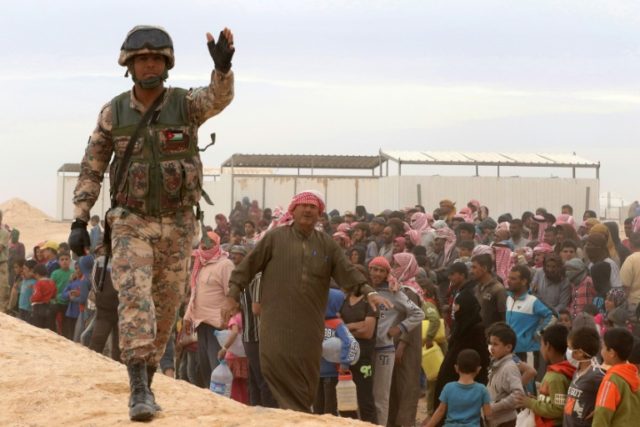 Jordan is hosting nearly 1.4 million Syrian refugees, such as these arrivals at the Al-Had