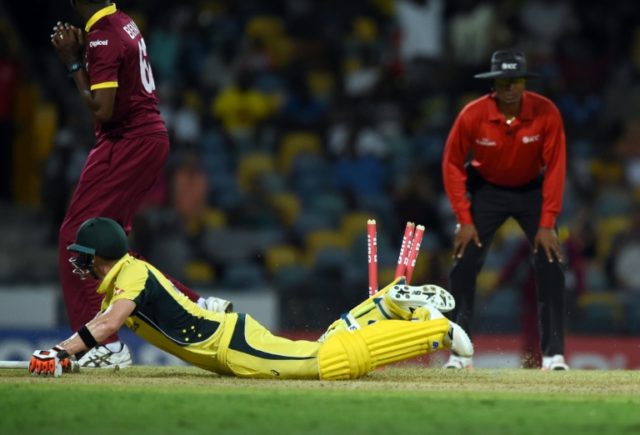 Australian captain Steven Smith gets run-out during the 8th One Day International match of