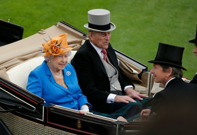 Britain's Queen Elizabeth II (L) and Britain's Prince Philip, Duke of Edinburgh arrive by