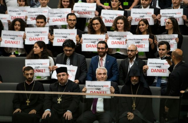 Armenian clergy men and activists express their "thanks" after German lawmakers voted to r