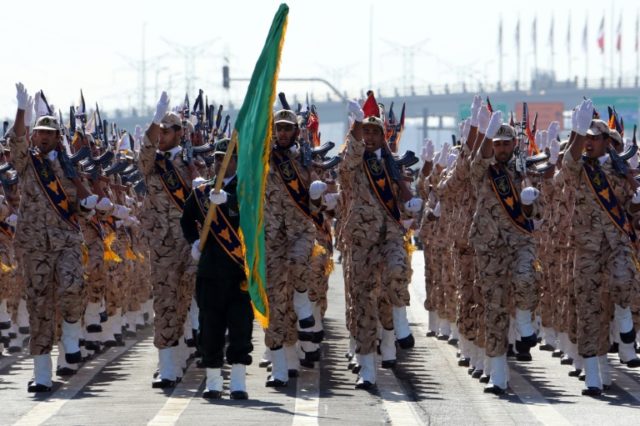 Iranian soldiers from the Revolutionary Guards march during the annual military parade in