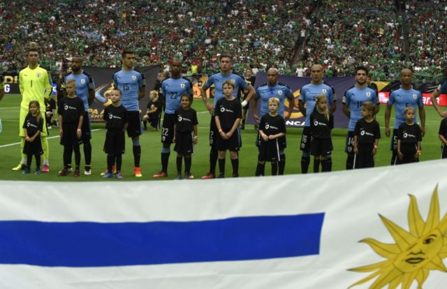 Before kick-off, Uruguay's players looked baffled as Chile's national anthem was played by