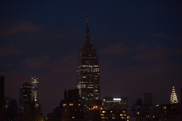 The Empire State Building goes dark in New York on June 12, 2016, in memory of the victims