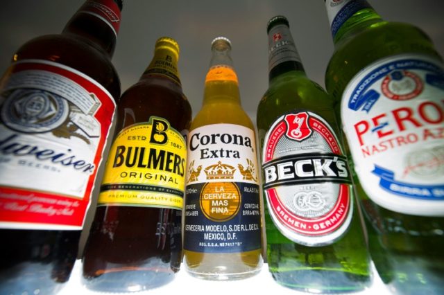 Bottles of beer and cider produced by InBev, (Budweiser, Corona and Beck's) and SABMiller