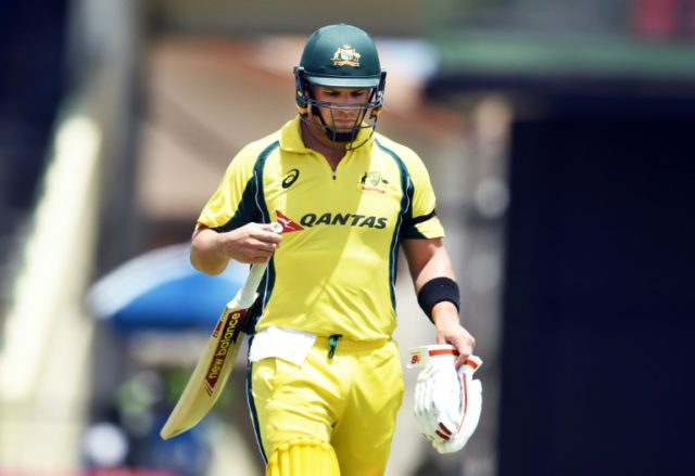 Australian cricketer Aaron Finch leaves the field after being dismissed by West Indies cri
