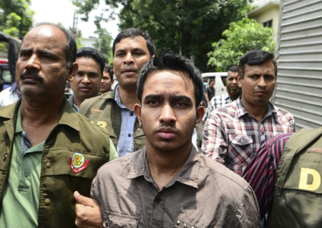 Bangladesh police in Dhaka on June 16, 2016 escort Islamist militant Suman Hossain Patowar
