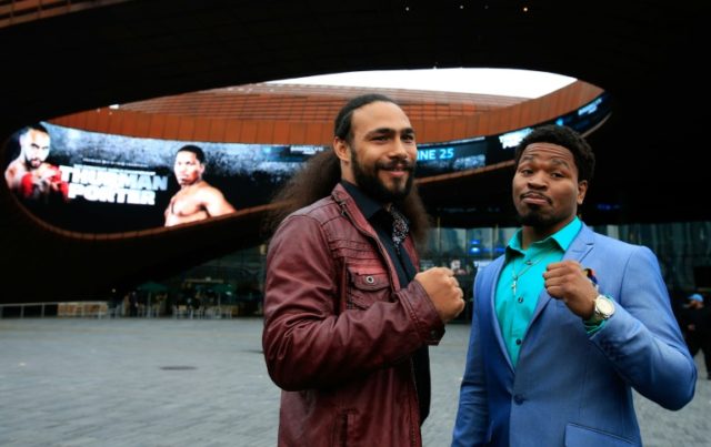 Welterweight world champion Keith Thurman (L) and former world champion Shawn Porter outsi
