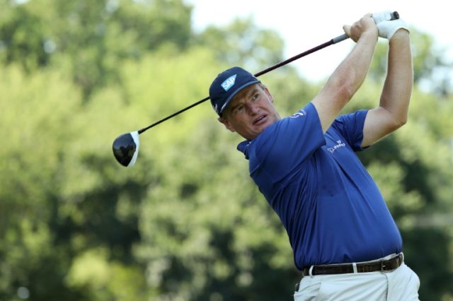 Ernie Els of South Africa plays a shot from the ninth tee during the third round of the Qu