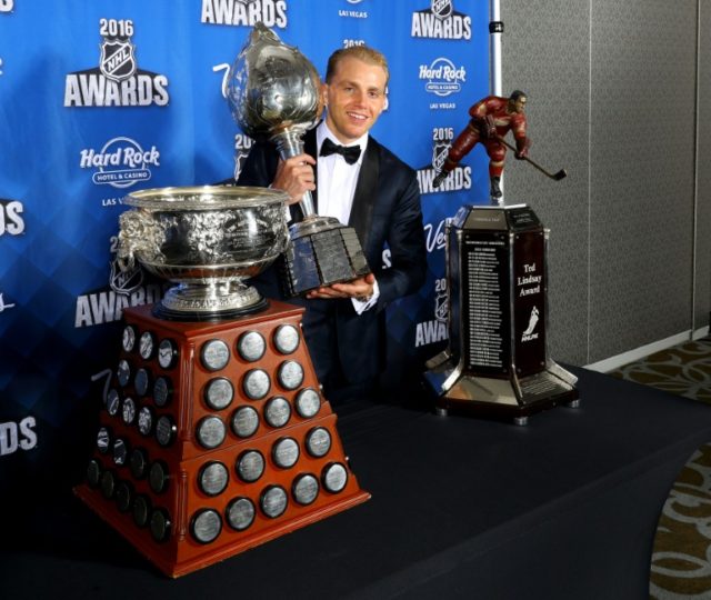 Patrick Kane of the Chicago Blackhawks poses after winning the Hart Trophy, the Ted Lindsa