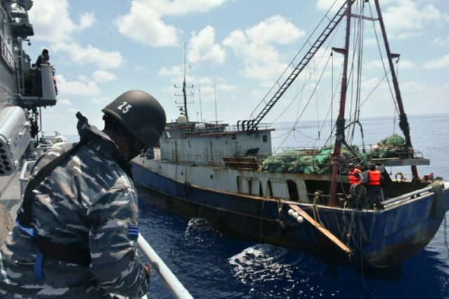 Indonesian War Ship KRI Imam Bonjol-363 arrests a Chinese fishing boat in Natuna water on