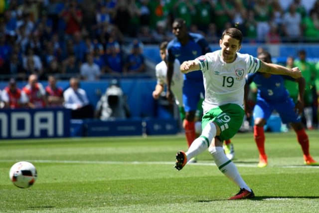 Ireland midfielder Robert Brady scores a penalty during the Euro 2016 round of 16 match ag