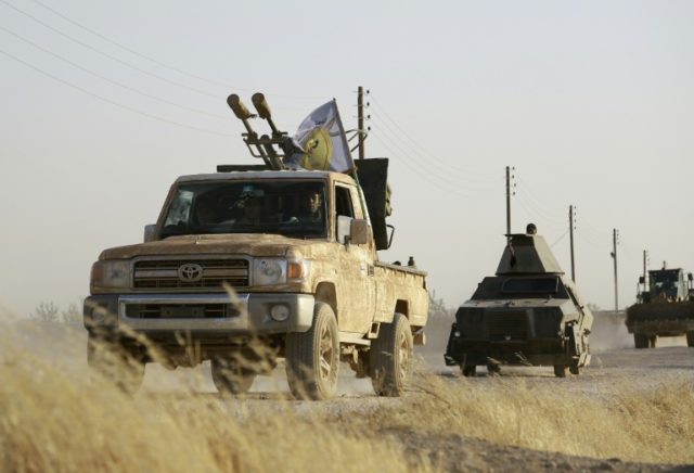 US-backed Kurdish and Arab fighters advance into the Islamic State (IS) jihadist's group b
